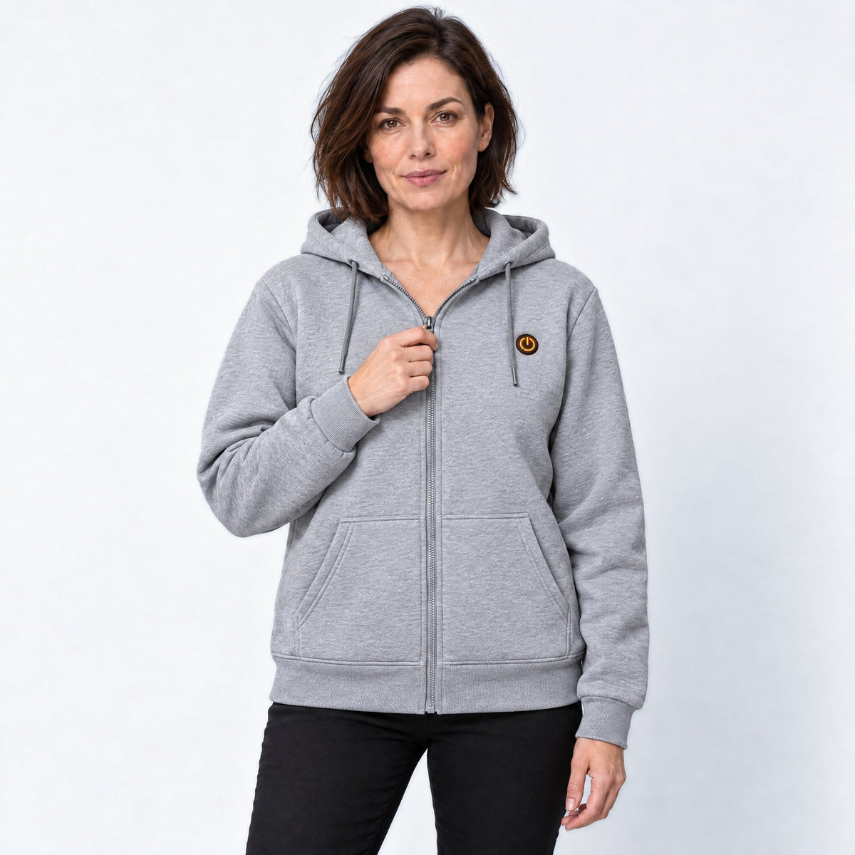 Sweat zippé chauffant Core Zip 6 grise porté par une femme, photo studio sur fond clair