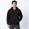 Sweat zippé chauffant Core Zip 6 noire porté par un homme, photo studio sur fond clair