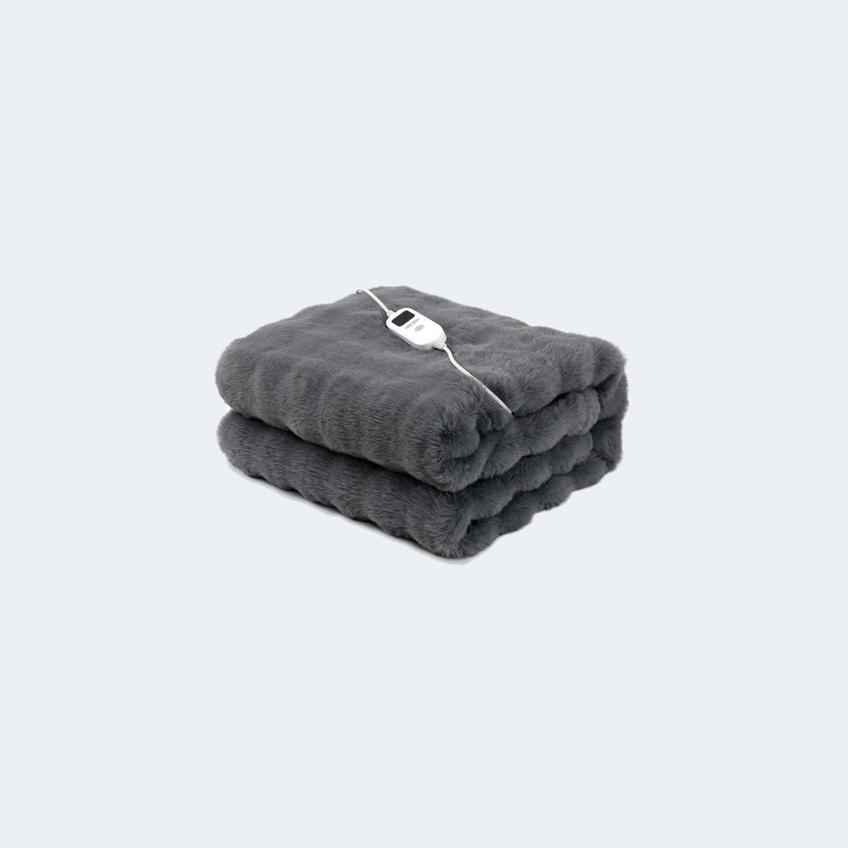 Plaid chauffant en fausse fourrure avec sa télécommande, photo produit sur fond gris clair